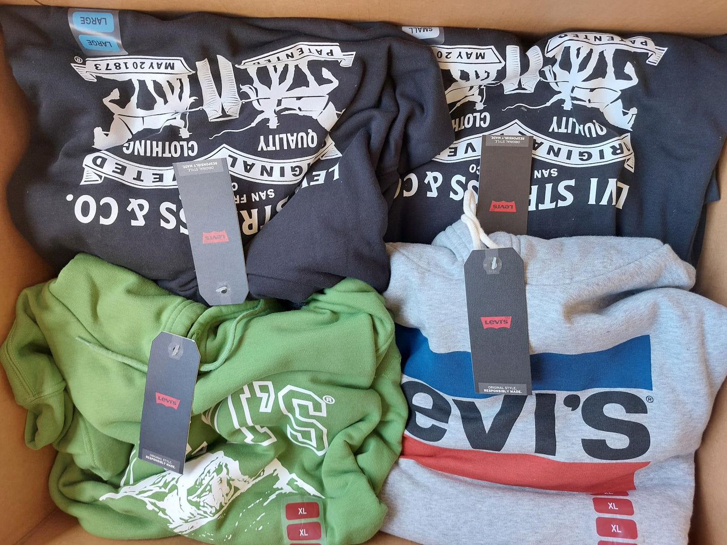Wholesale Lot of Mens Levi Graphic Hoodies and Tampa Bay Bucs Tees Brand New