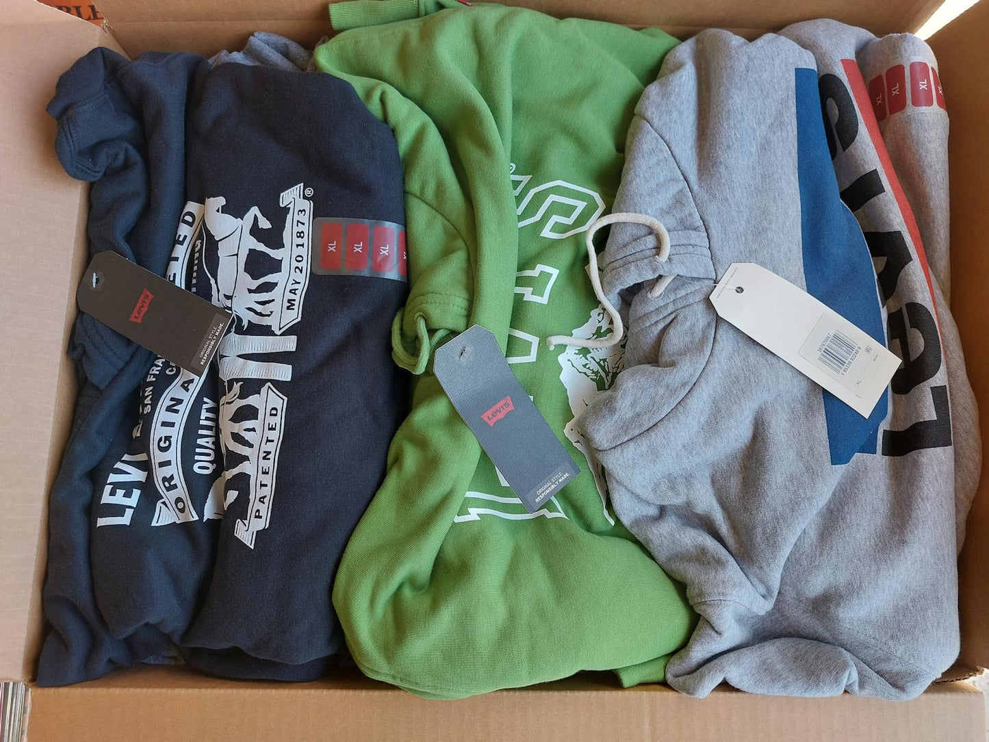 Wholesale Lot of Mens Levi Graphic Hoodies and Tampa Bay Bucs Tees Brand New