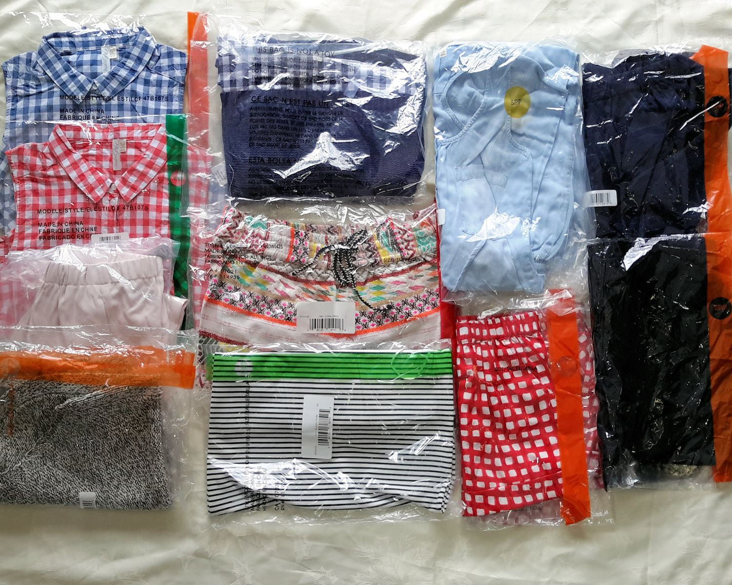 Wholesale Lot of Womens Jumpsuits Pants Shorts Skirts Tops Brand New Overstock